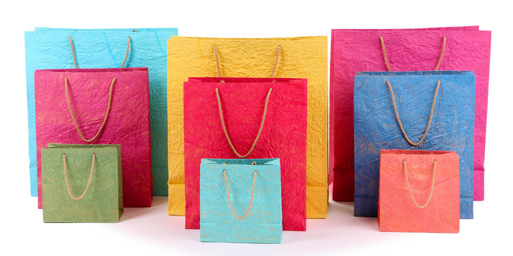 A paper bag with three size variations (large, medium, and small) and nine color variations